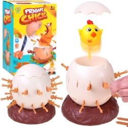 Juego de mesa con pollito saltarín