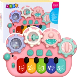 Pianito interactivo rosa para niños con engranajes