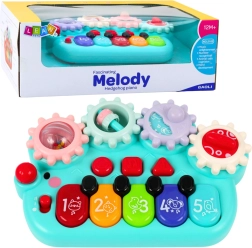 Pianito infantil interactivo con engranajes azul