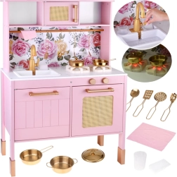 Cocinita infantil de madera rosa con fogones luminosos y accesorios dorados