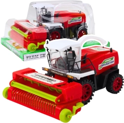 Cosechadora agrícola roja con tracción por fricción
