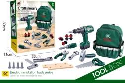 Mochila del pequeño manitas con herramientas y taladro