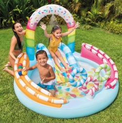 Centro de juegos inflable Candy con tobogán y ducha de agua