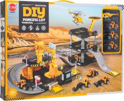 Juego de construcción de aparcamiento y obra con cochecitos y helicóptero