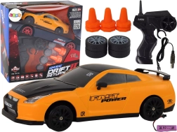 Coche deportivo RC 1:24 con ruedas intercambiables – Amarillo