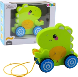 Dinosaurio de arrastre con cuerda para bebés con sonidos