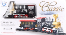 Vía de tren clásica con locomotora humeante