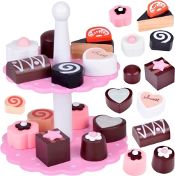 Juego infantil de madera de dos niveles con pastelitos