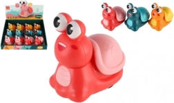 Caracol de juguete con inercia para niños 8 cm