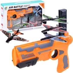 Juguete infantil: lanzador de aviones tipo pistola