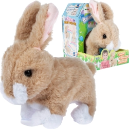 Conejito de peluche beige a pilas