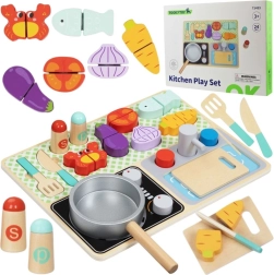 Cocinita de madera con accesorios para un pequeño chef