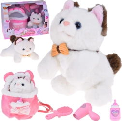 Suave gatito de peluche con latido de corazón y patitas flexibles en una mochila rosa