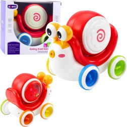 Caracol interactivo con ruedas y tambor musical – rojo
