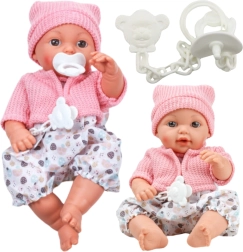 Muñeca de trapo con gorrito y sonidos