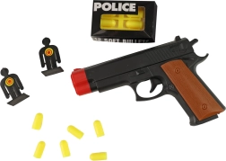 Pistola de policía con dianas y proyectiles blandos