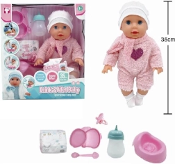 Muñeca 35 cm bebe y hace pis Tosia con accesorios