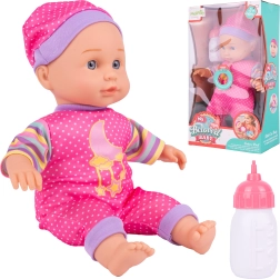 Muñeca bebé con biberón para alimentar