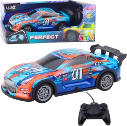 Coche de carreras RC con carrocería luminosa, naranja‑turquesa