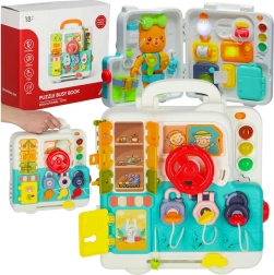 Tablero sensorial manipulativo en forma de maletín con volante y osito, luz y sonido