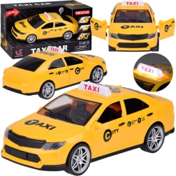 Taxi infantil con luces y sonidos y puertas abatibles