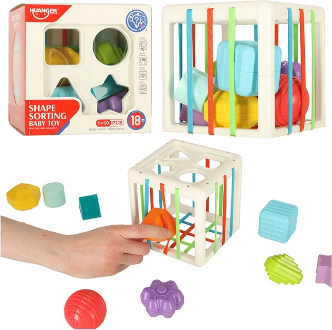 Cubo sensorial elástico con encajable de formas