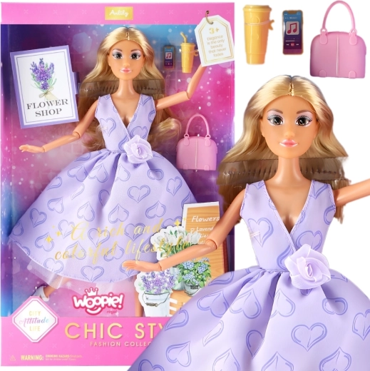 Muñeca Woopie Lily con pelo rubio largo 30 cm con vestido lavanda y accesorios