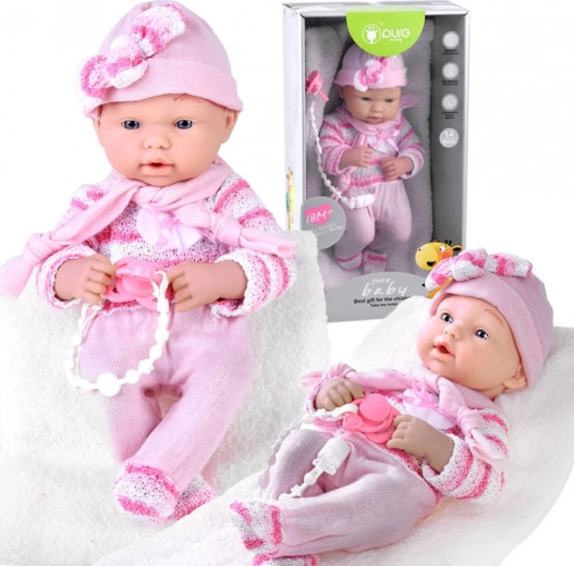 Muñeca bebé realista rosa con chupete en cadena y manta suave