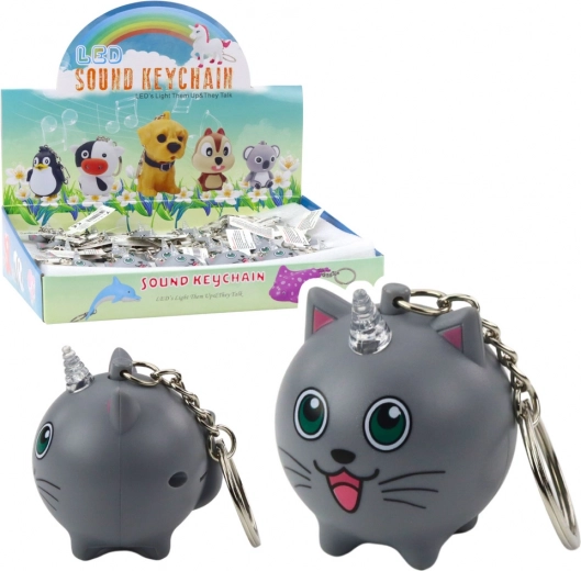 Llavero gatito unicornio con cuerno LED y sonido, gris