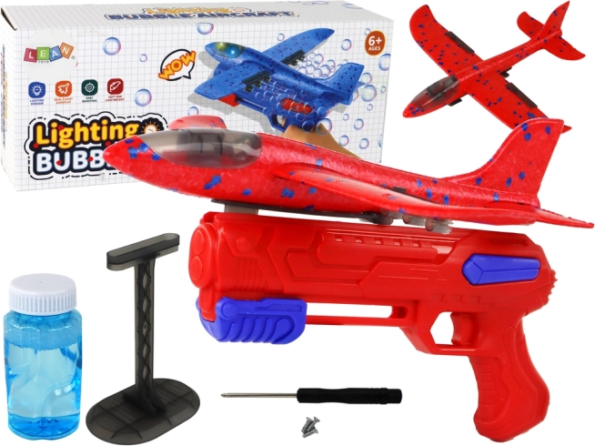 Avión de burbujas con lanzador rojo