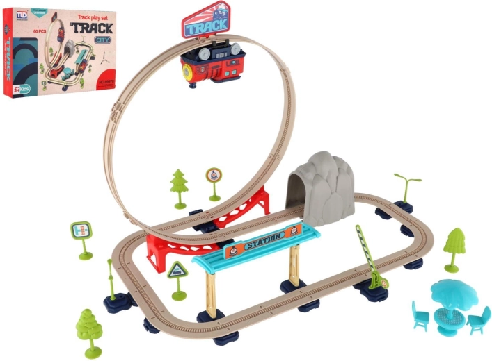 Vía de tren con tren a pilas y accesorios (60 piezas)