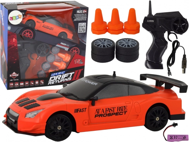 Coche deportivo RC 1:24 naranja con ruedas intercambiables