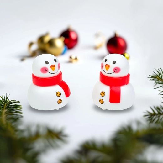 Muñeco de nieve con mecanismo de cuerda que rueda