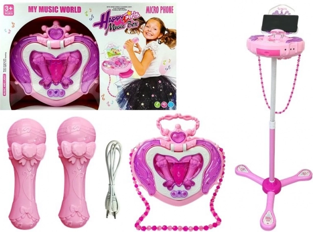 Set de karaoke rosa para niños con soporte, dos micrófonos y joyero en forma de corazón
