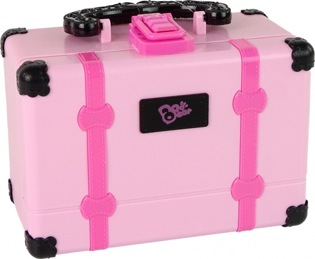 Todo organizado en un maletín rosa con espejo