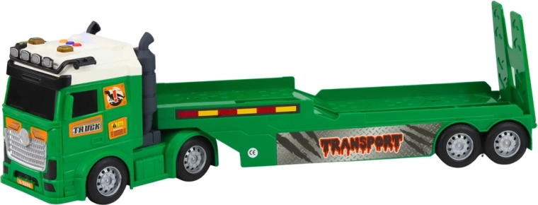 Camión tractor con semirremolque de plataforma baja y efectos