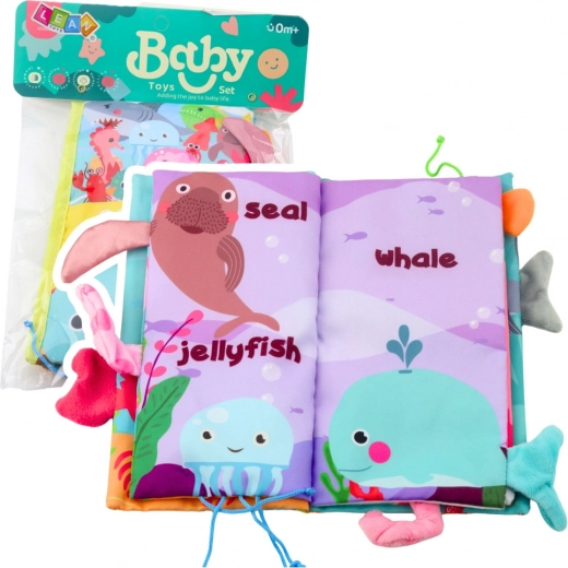 Libro sensorial suave Animales marinos con páginas crujientes y silbato