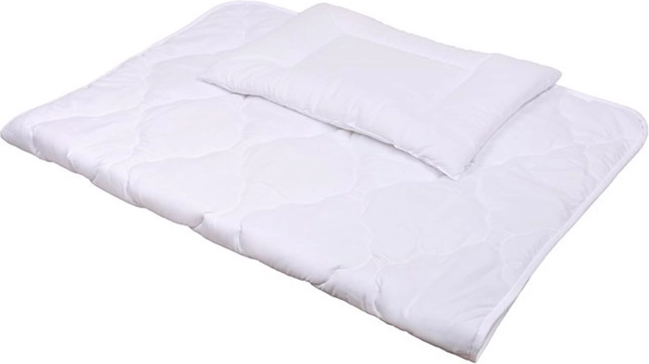 Manta y almohada confortables con acolchado