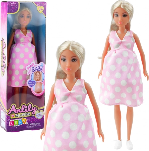Muñeca Anlily embarazada con vestido rosa de lunares y pelo largo