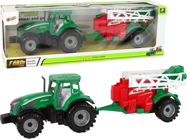 Tractor verde con pulverizador rojo‑verde y propulsión por fricción