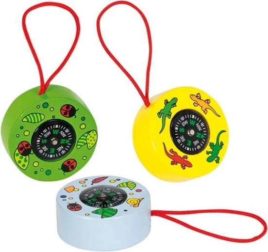 Brújula infantil Goki con dibujos y cordón