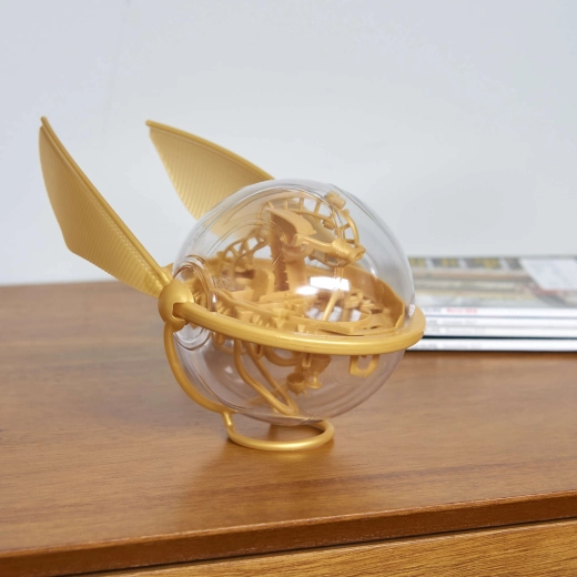 Diseño de la Snitch dorada del mundo de Harry Potter