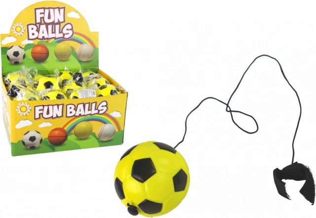 Balón de fútbol con goma tipo yo-yo 6 cm – amarillo