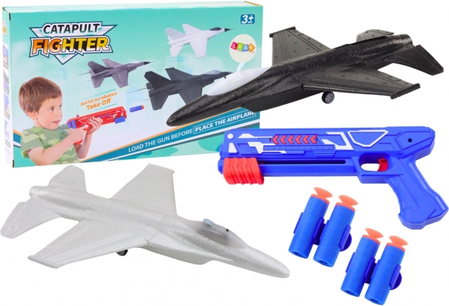Pistola azul de doble función con lanzador de aviones
