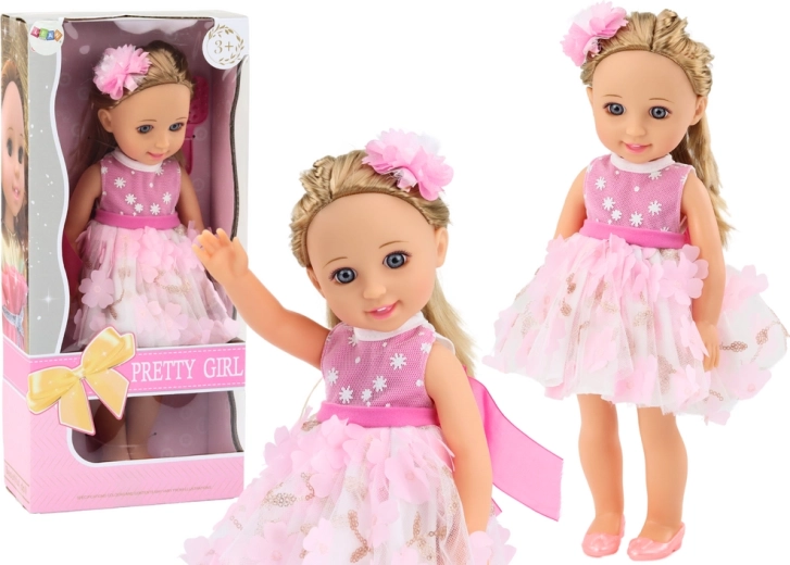 Muñeca con vestido rosa, pelo largo y cepillo 38 cm