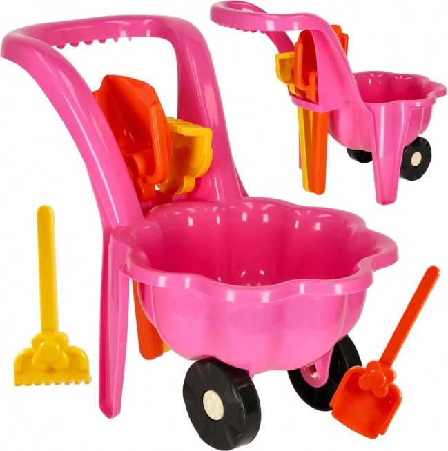 Carretilla infantil rosa con set para arena Margarita – pala y rastrillo