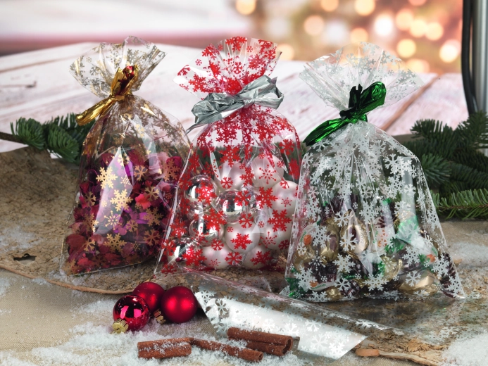 Bolsa de celofán 20 × 32 cm con motivo de copos de nieve, transparente