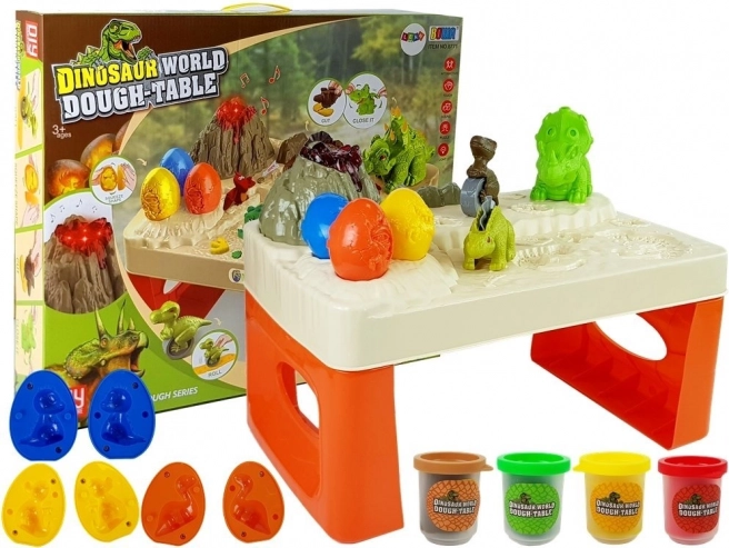 Mesa de juego de dinosaurios con plastilina y lava luminosa
