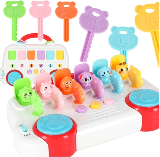 Autobús educativo musical con llaves y animales que saltan