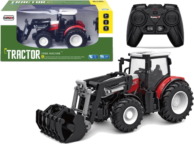 Tractor rojo teledirigido 2,4 GHz con pala móvil 1:24